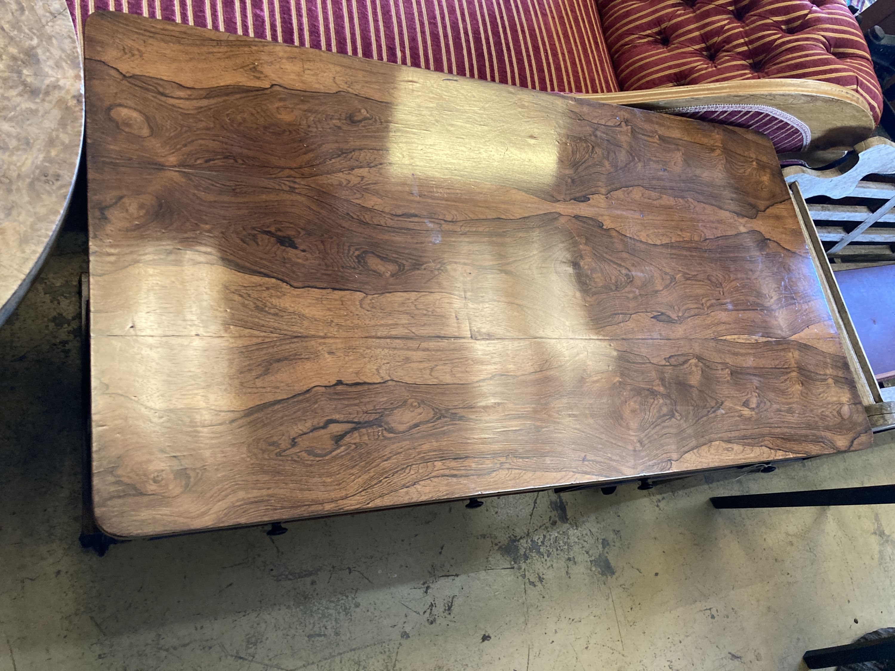 A Victorian rectangular rosewood two drawer library table, width 126cm, depth 66cm, height 76cm